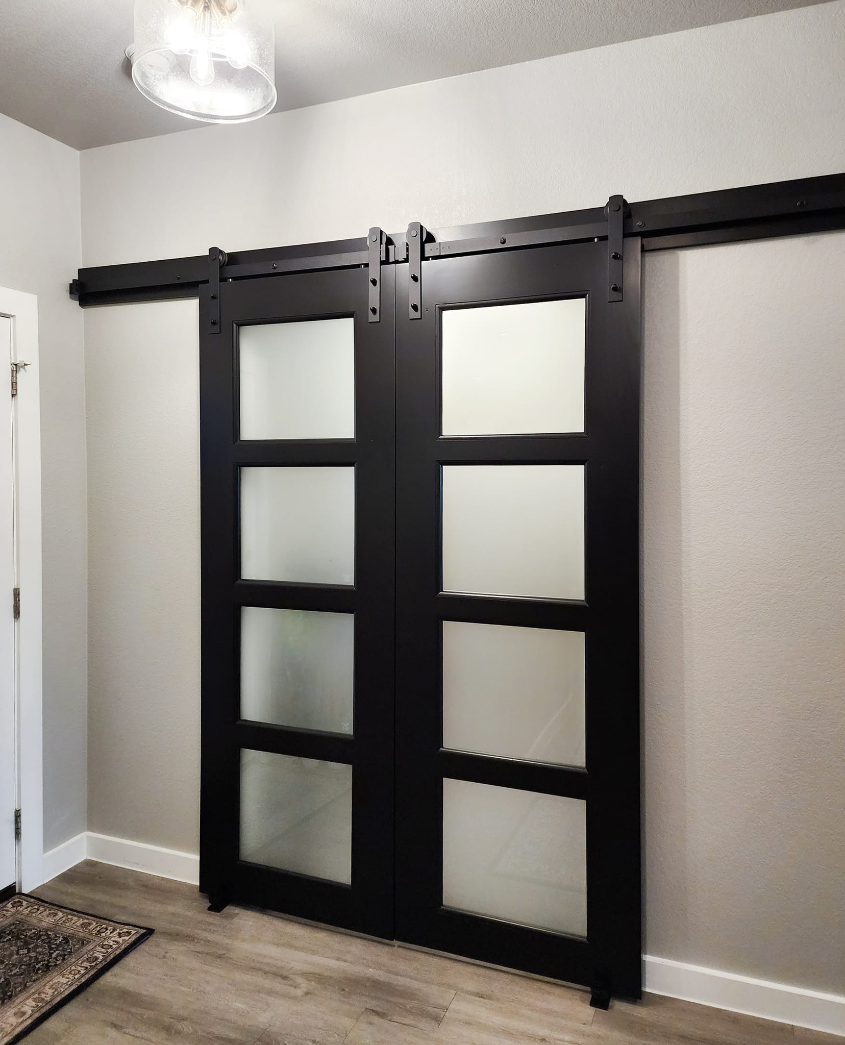 Custom barn door by Wooden Woodworks